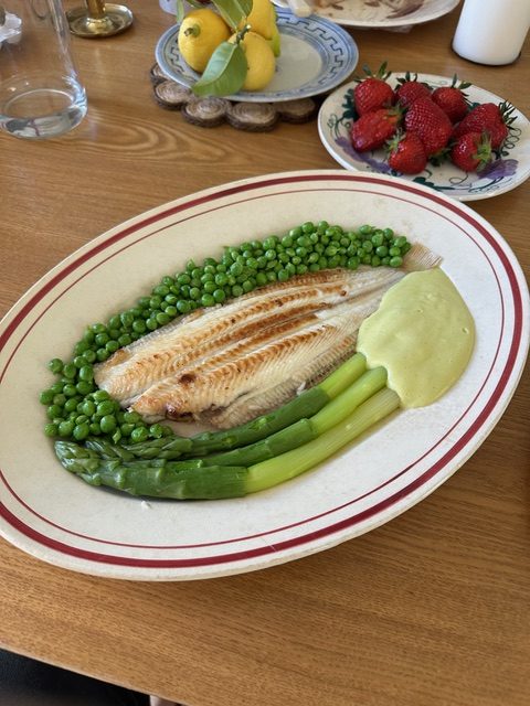 Pan-fried sole with peas, asparagus and chive sabayon